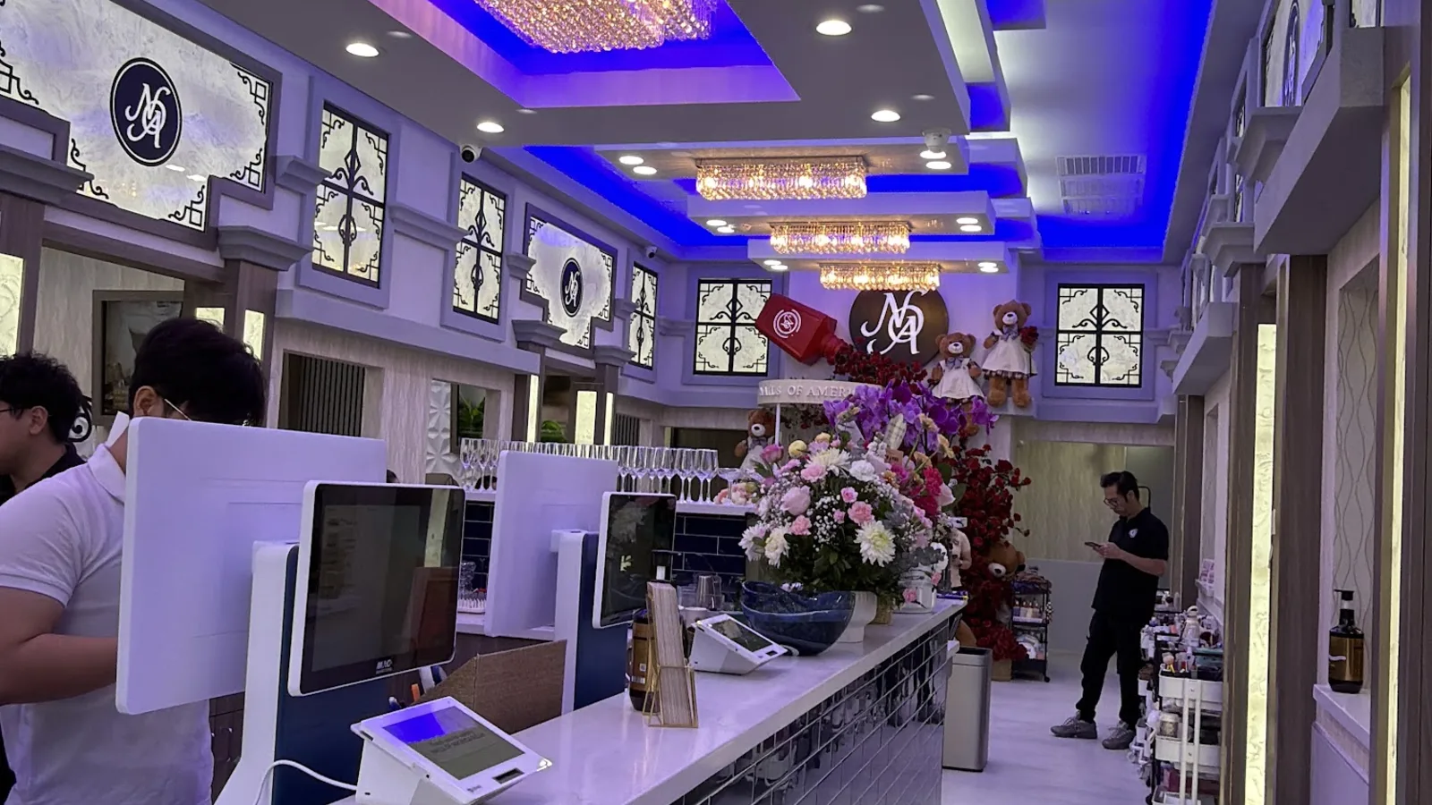 Reception desk finished in navy tile