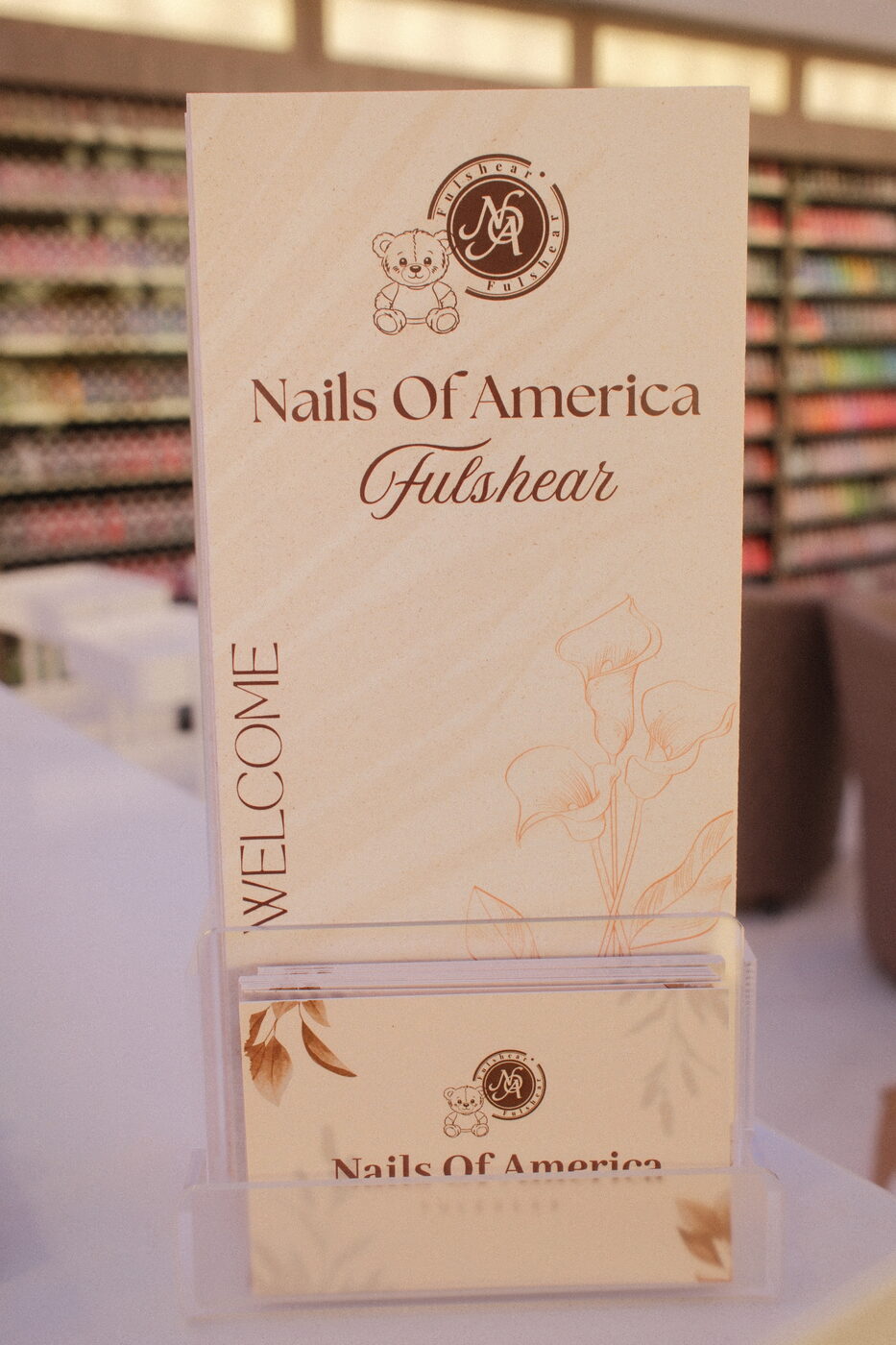 Welcome cards featuring the Nails of America Fulshear brand