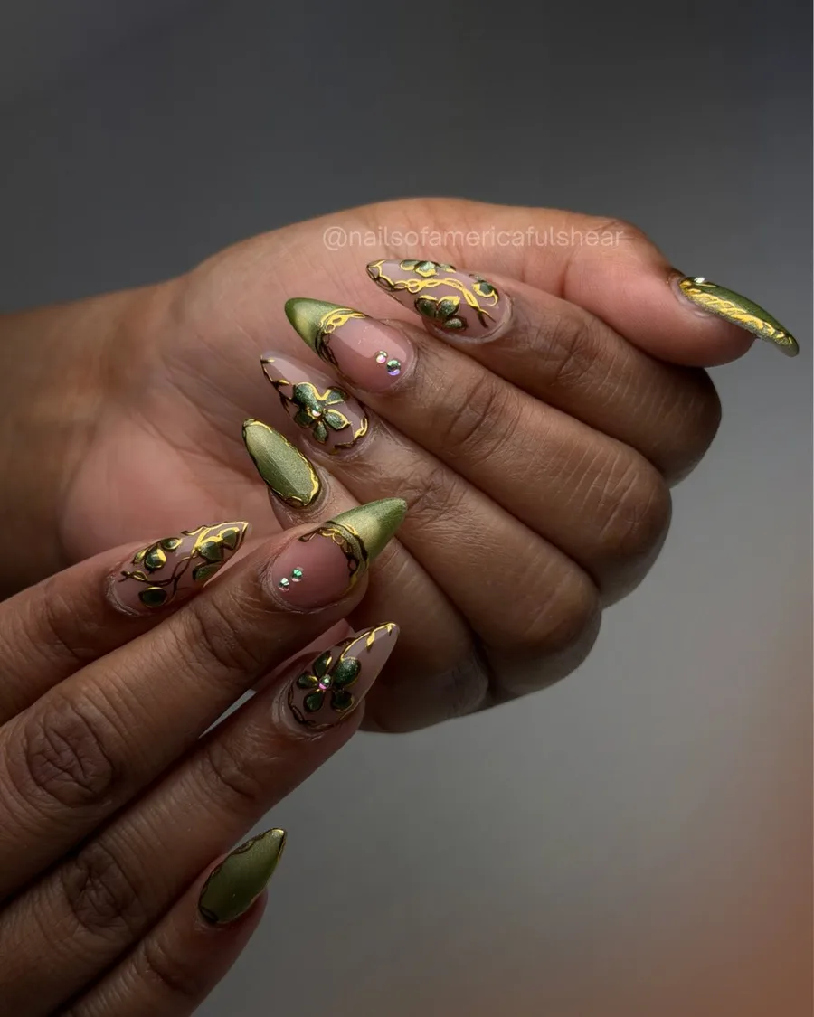 Olive chrome nails finished with gold foil