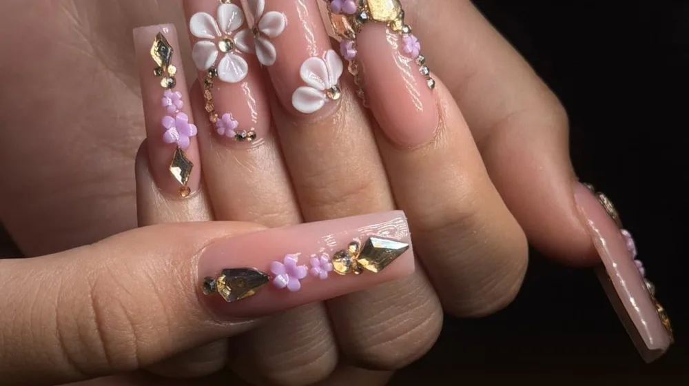 Sculpted pink nail set with 3D florals and rhinestones