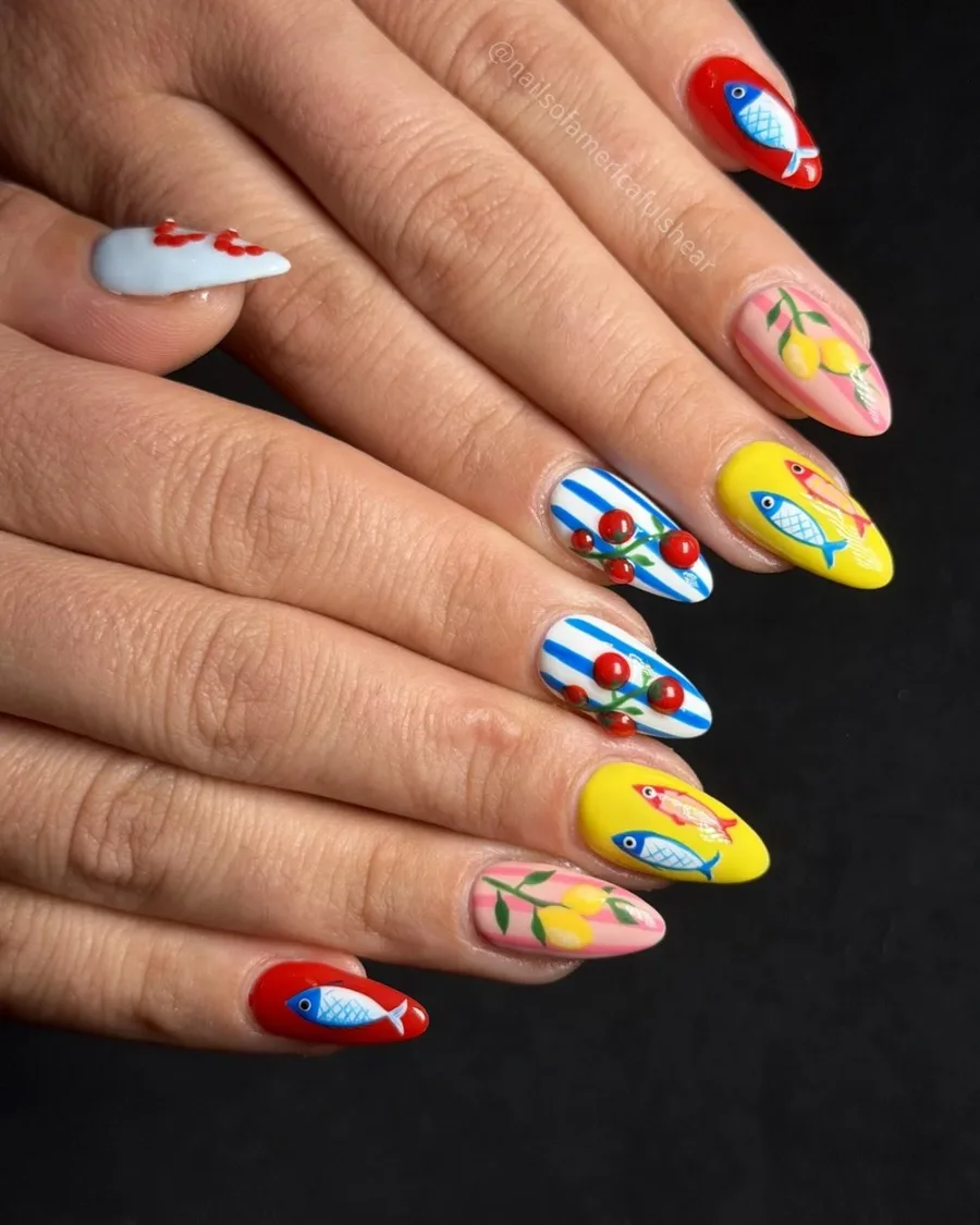 Hand-painted fish art on almond nails